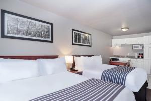 Cama ou camas em um quarto em Sandman Inn Cache Creek