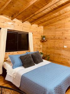 Cama o camas de una habitación en Susurro del bosque