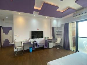 Postel nebo postele na pokoji v ubytování Beauty House Homestay