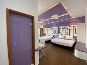 Postel nebo postele na pokoji v ubytování Beauty House Homestay