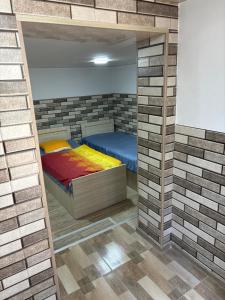 Voodi või voodid majutusasutuse Downtown guest house toas