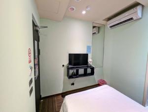 TV a/nebo společenská místnost v ubytování Macchi Hotel - Taipei