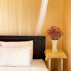 Katil atau katil-katil dalam bilik di Bee Friend Boutique Guesthouse