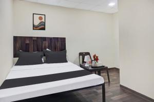 Cama o camas de una habitación en OYO Highway Lodge