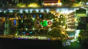 an aerial view of a resort at night at Castle Bayview Resort & Spa in Kampot