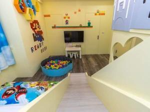 Telewizja i/lub zestaw kina domowego w obiekcie Haoyue Tongxin Family Homestay
