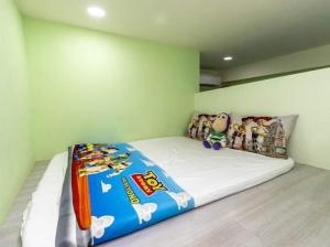 Łóżko lub łóżka w pokoju w obiekcie Haoyue Tongxin Family Homestay