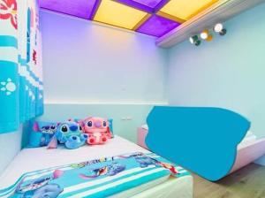 Łóżko lub łóżka w pokoju w obiekcie Haoyue Tongxin Family Homestay
