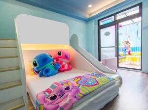 Łóżko lub łóżka w pokoju w obiekcie Haoyue Tongxin Family Homestay