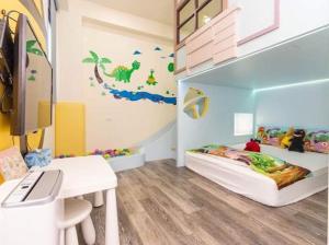 TV a/nebo společenská místnost v ubytování Haoyue Tongxin Family Homestay