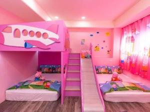 Łóżko lub łóżka w pokoju w obiekcie Haoyue Tongxin Family Homestay