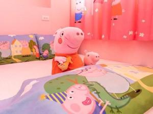 Łóżko lub łóżka w pokoju w obiekcie Haoyue Tongxin Family Homestay