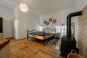 Katil atau katil-katil dalam bilik di Apartman Lucie