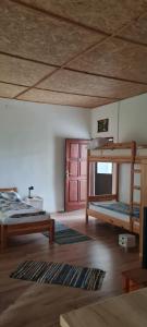 Postel nebo postele na pokoji v ubytování Larida Vendégház
