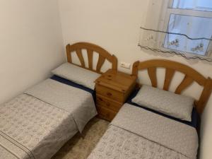 Łóżko lub łóżka w pokoju w obiekcie ALEGRIA ID110