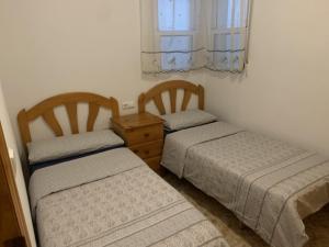 Łóżko lub łóżka w pokoju w obiekcie ALEGRIA ID110
