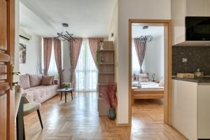 Postel nebo postele na pokoji v ubytování Apartments Elena