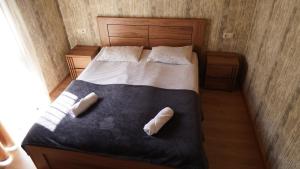 Katil atau katil-katil dalam bilik di Archil and Nino Gigauri Guest House