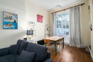 אזור ישיבה ב-GuestReady - Former Pub-Turned-One Bedroom Flat