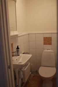 Koupelna v ubytování Olarsgården Hotell