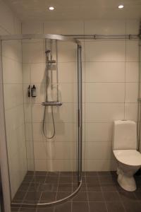 Koupelna v ubytování Olarsgården Hotell