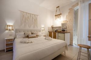 Ένα ή περισσότερα κρεβάτια σε δωμάτιο στο Dimora Giulia +15 φωτογραφίες