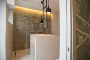 Een badkamer bij Albergo Diffuso Dimora Rossi Suite B&B