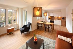 Posezení v ubytování Plumbohms Haus Looges