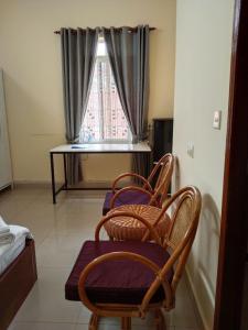 Posezení v ubytování Room 12 - Studio in a villa 5mn walk from the Royal Palace with swimming pool