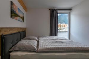 Una cama o camas en una habitación de Ferienwohnung Klugis