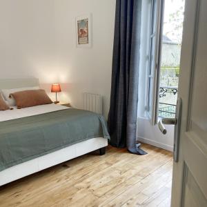 Postel nebo postele na pokoji v ubytování Maison Le Clos des Cerfs by La Boîte En Plus