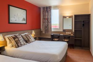 Postel nebo postele na pokoji v ubytování Ace Hotel Annemasse Genève