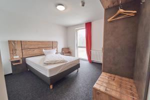 Postel nebo postele na pokoji v ubytování Hotel am Interpark
