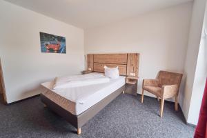 Postel nebo postele na pokoji v ubytování Hotel am Interpark