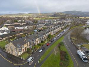 an aerial view of a city with cars parked at Ochil View in Stirling