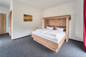 Postel nebo postele na pokoji v ubytování Hotel am Interpark