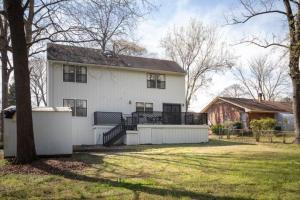 a white house with a fence in the yard at Forest Hills Fresh-Centrally Located, Pets, Wifi in Montgomery