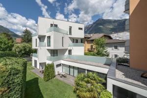 an aerial view of a white building at Residence Désirée Classic & Design in Merano
