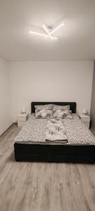 Postel nebo postele na pokoji v ubytování Apartman Stanković