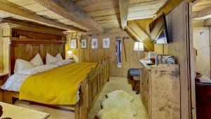Posteľ alebo postele v izbe v ubytovaní Ca' Scocc, antica casa di montagna in Valsesia