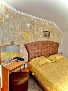 Postel nebo postele na pokoji v ubytování Family Hotel The Golden fish