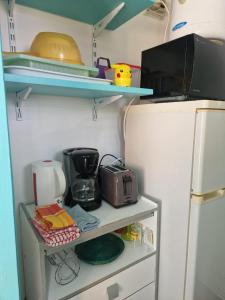 Kuchyň nebo kuchyňský kout v ubytování L'Alizé - Résidence la Plage de l'Anse Caritan