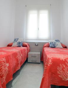Postel nebo postele na pokoji v ubytování Petit