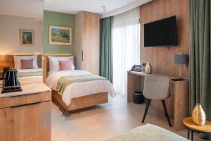 TV o dispositivi per l'intrattenimento presso Dve Kule Resort & Winery