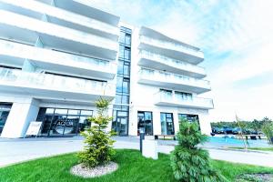 Bazén v ubytovaní Horyzont Apartamenty -Polanki AQUA- Strefa SPA z basenem i fitness studio, prywatny garaż alebo v jeho blízkosti