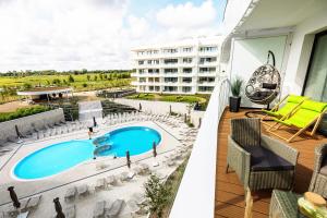 Bazén v ubytovaní Horyzont Apartamenty -Polanki AQUA- Strefa SPA z basenem i fitness studio, prywatny garaż alebo v jeho blízkosti