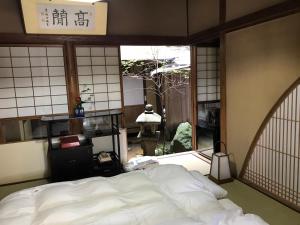 เตียงในห้องที่ 金文堂 kinbundo