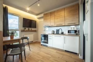 Dapur atau dapur kecil di WiguryTower Apartaments 90
