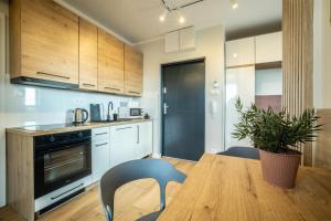 Dapur atau dapur kecil di WiguryTower Apartaments 90