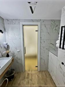 Kúpeľňa v ubytovaní Ventre luxury rooms